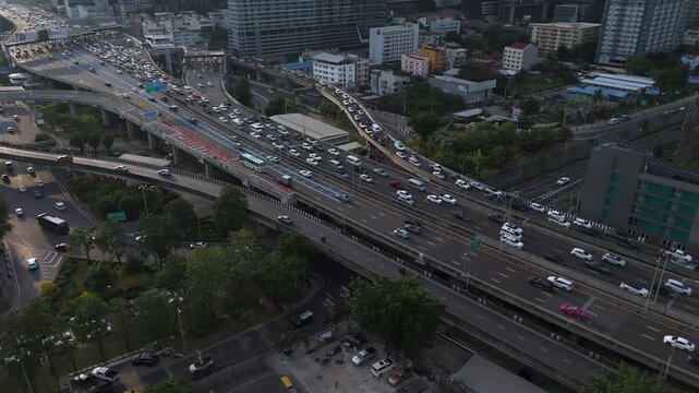 Vehicles On Elevated Roads Of The Si Rat Expressway Toll Road Along Bang Kapi, Huai Khwang, Bangkok, Thailand. Aerial Drone Shot