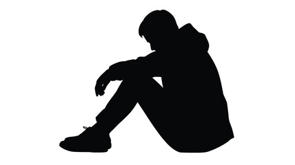 Silhouette of a Depressed Man Sitting on the Floor in Despair