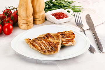 Grilled pork steak with sauce