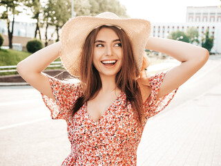 Portrait of young beautiful smiling hipster female in trendy summer sundress.Sexy carefree woman...