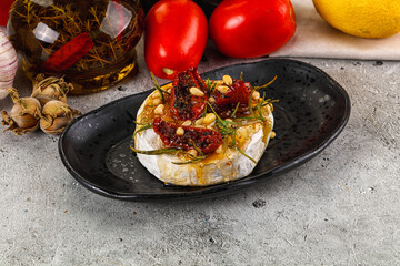 Baked camembert cheese with honey