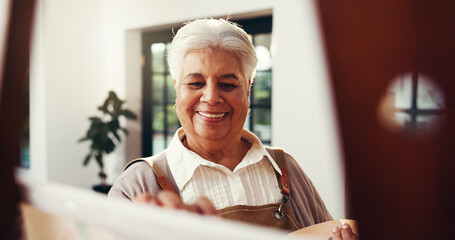 Elderly woman, home and artist painting for creative self expression, talent or art. Retirement...