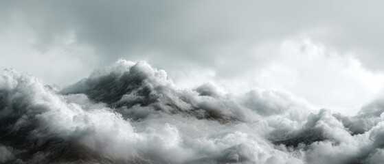 Obraz premium Dramatic clouds in a stormy sky above mountains.