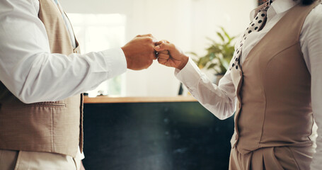 Fist bump, greeting and business people in hotel for partnership, welcome or teamwork....