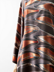 abstract silk fabric waves with copper and brown hues