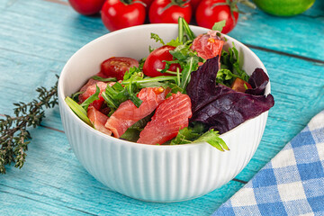 Salad with salmon and arugula