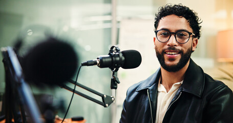 Microphone, podcast and portrait of man in recording studio for live streaming or radio broadcast....