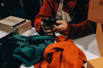 Portrait of Starting small businesses SME owners, two Asian woman check online orders Selling...