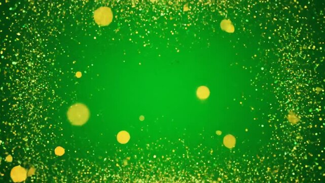 Shining golden glitter particles sparkle on a vibrant green gradient background loop