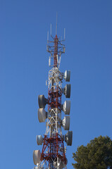 image of the telecommunication antennas seen on top of the mountain