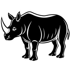 Obraz premium Powerful black rhinoceros standing proudly silhouette