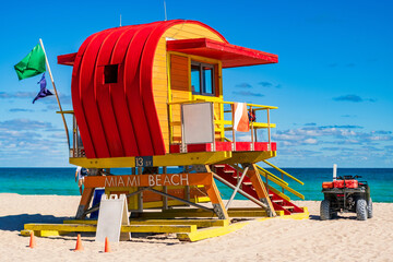 Miami pier. Jetty lifeguard tower on Miami Beach. Scenic view of Miami Beach coastline. Famous...