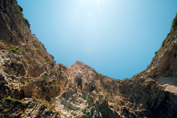 Rocky Cliffs Under Clear Blue Sky