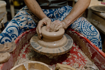 Artist in Ceramics and Pottery Studio working
