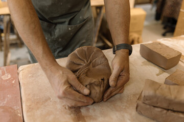 Artist in Ceramics and Pottery Studio working