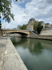 Naklejka premium View from walkway along bank of the River Seine in Paris, France.