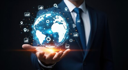 Businessman holding a glowing digital globe with network connections and business icons