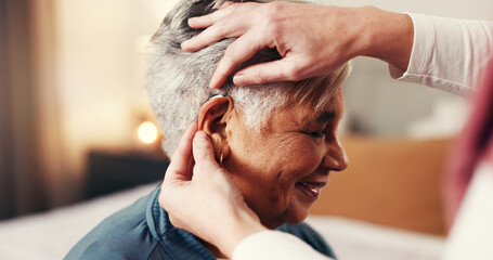 Hands, elderly woman and hearing aid with nurse, smile or help with fitting in retirement home....