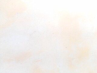 A faded wall texture with soft yellowish marks, giving a gentle aged look, perfect for artistic or rustic designs.