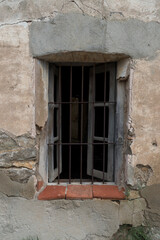 old window of a rural house with its original lattice