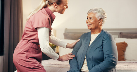 Obraz premium Caregiver, senior woman and happy in nursing home for assisted living, homecare and help. Elderly patient, nurse and talking in bedroom for healthcare, frail care and support at retirement facility