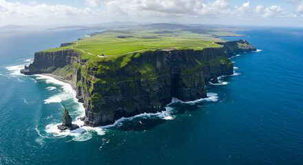 Dramatic coastal cliffs dropping into the ocean, wild and rugged landscape