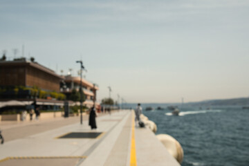 People enjoy leisure time by the water on a warm afternoon