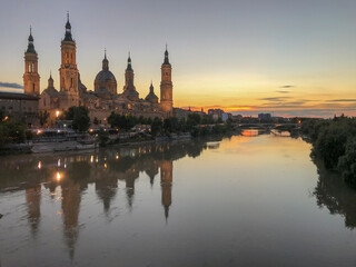 Naklejka premium images of the basilica del pilar next to the ebro river