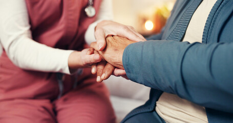 Caregiver, senior person and holding hands in home for medical service, kindness and homecare....