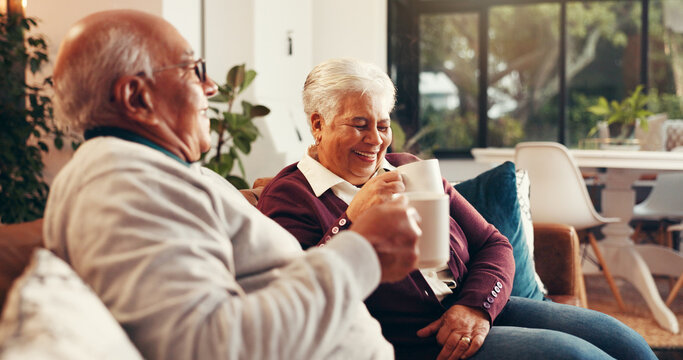 Coffee, laugh and senior couple on sofa in home with conversation, bonding or relax together. Happy, cappuccino and elderly man with woman for retirement in living room for calm morning in house.