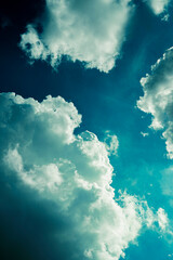 Teal Sky, White Clouds: Dramatic Atmospheric Background