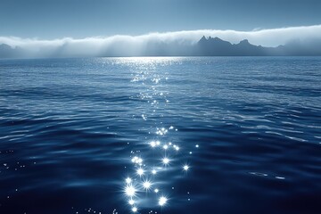 Calm ocean, misty mountains