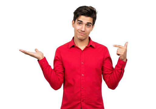 A young man in a red shirt shrugs and points, expressing confusion or uncertainty about a choice isolated on transparent background