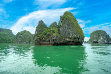 Amazing view of geological wonders of limestone islands in Halong bay in summer, Quang Ninh, Vietnam