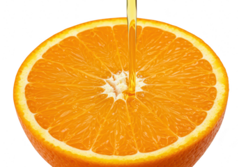 Juice pouring into a fresh orange slice isolated on a transparent background
