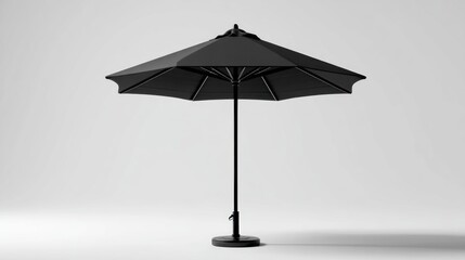 Obraz premium Large black patio umbrella with a sturdy pole and base, ideal for shade