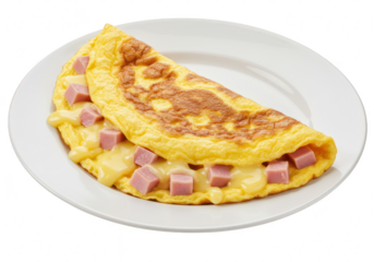 A fluffy, goldenbrown omelette filled with ham and melted cheese, served on a white plate for a hearty breakfast isolated on transparent background