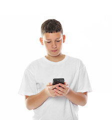 Teenage boy with smartphone on white background