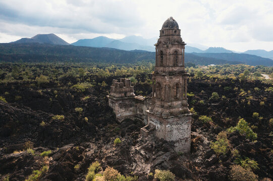 Aereal view of San Juan Paricutin church on a volcanic rock field