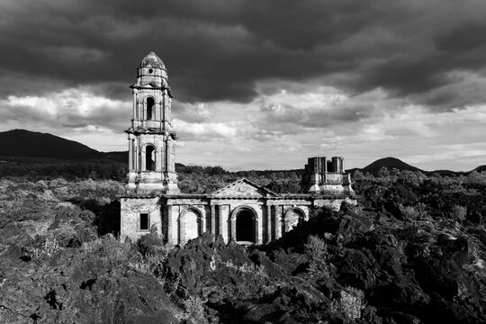 Facade of San Juan Paricutin church with cloudy sky