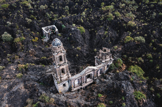 Aereal view of San Juan Paricutin church on a volcanic rock field