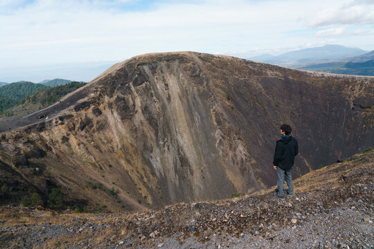 One man standing at the ridge of the crater of Paricutin volcano