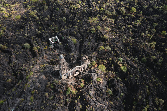 Aereal view of San Juan Paricutin church on a volcanic rock field