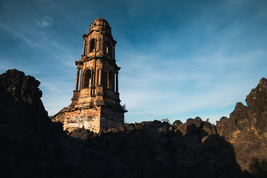 Tower of the ruins of San Juan Paricutin church in volcanic rock