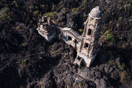 Aereal view of San Juan Paricutin church on a volcanic rock field