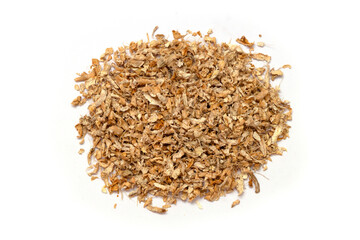 Top view of crushed dried ginger root (sunth), an aromatic cooking and medicinal herb.