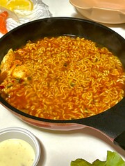 Shin Ramyun,close up of Ramyeon or Ramyun is a Korean-style soup noodle dish with a spicy flavor. Ramyeon or Korean instant noodles with egg - Korean food style