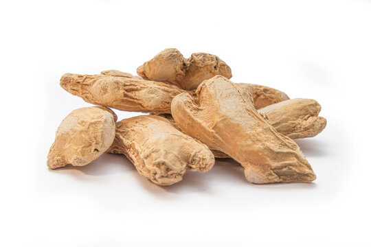 Whole dried ginger root (sunth), an aromatic and versatile spice for culinary and medicinal uses.