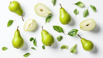 Fresh whole and sliced pears with leaves on white background