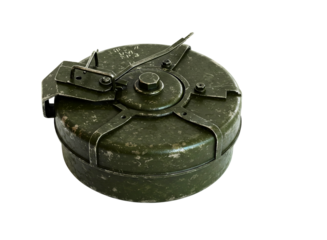 Vintage military anti tank mine with metal casing and activation mechanism isolated on transparent background